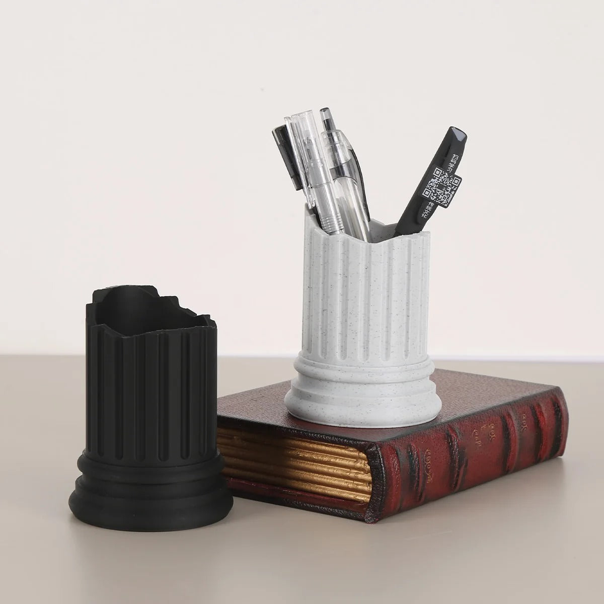 broken ancient column shaped pen holder