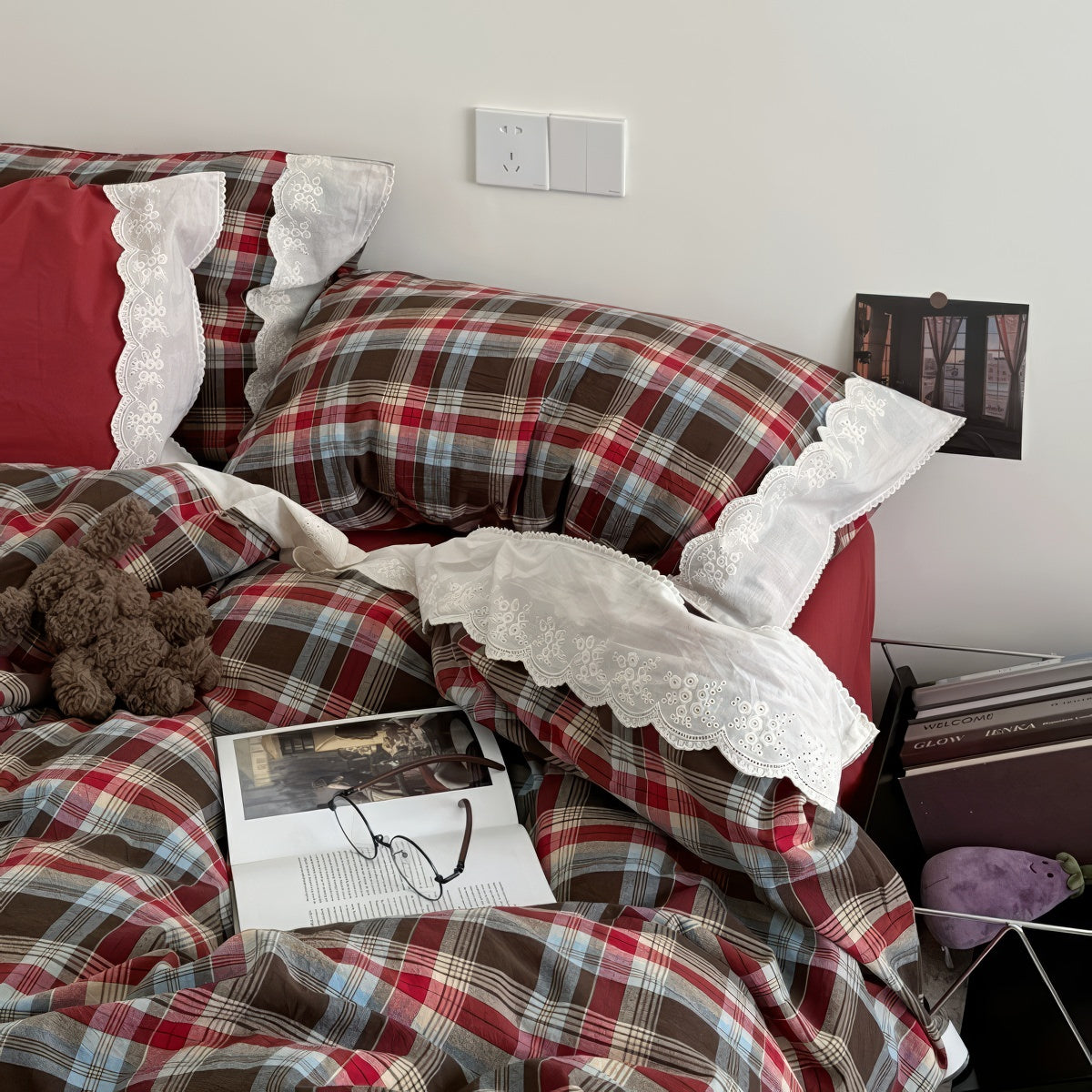 Bavarian plaid bedding set with red and brown checks and white lace ruffled trim on duvet cover and pillowcases.
