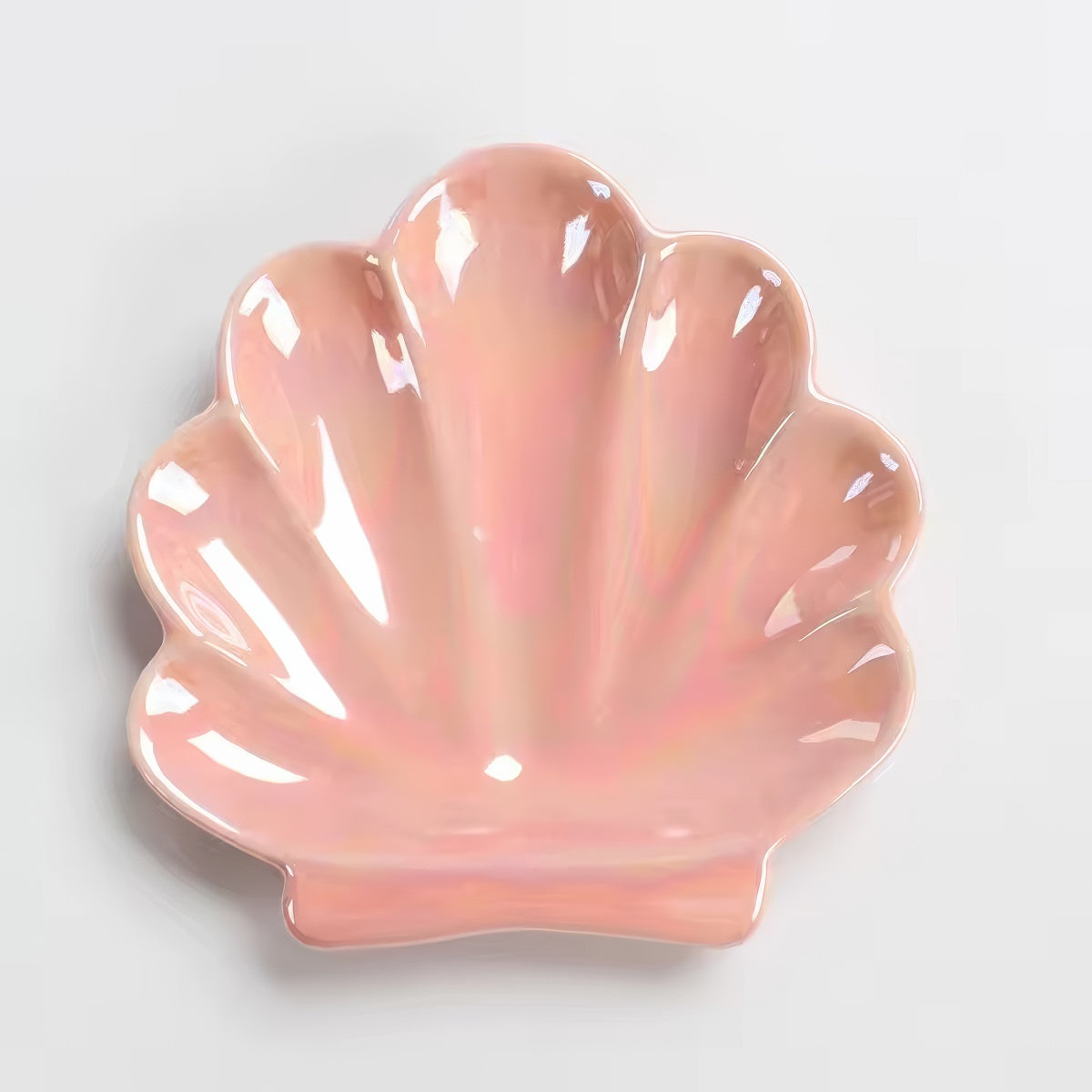 pink and white seashell shaped ceramic jewelry tray