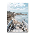Coastal boho aesthetic wall art gallery set with ocean waves, sandy paths, palm trees, vintage van, and beach photography in blue and beige tones.