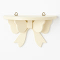 bow shaped wooden mini wall storage shelf for coquette aesthetic rooms