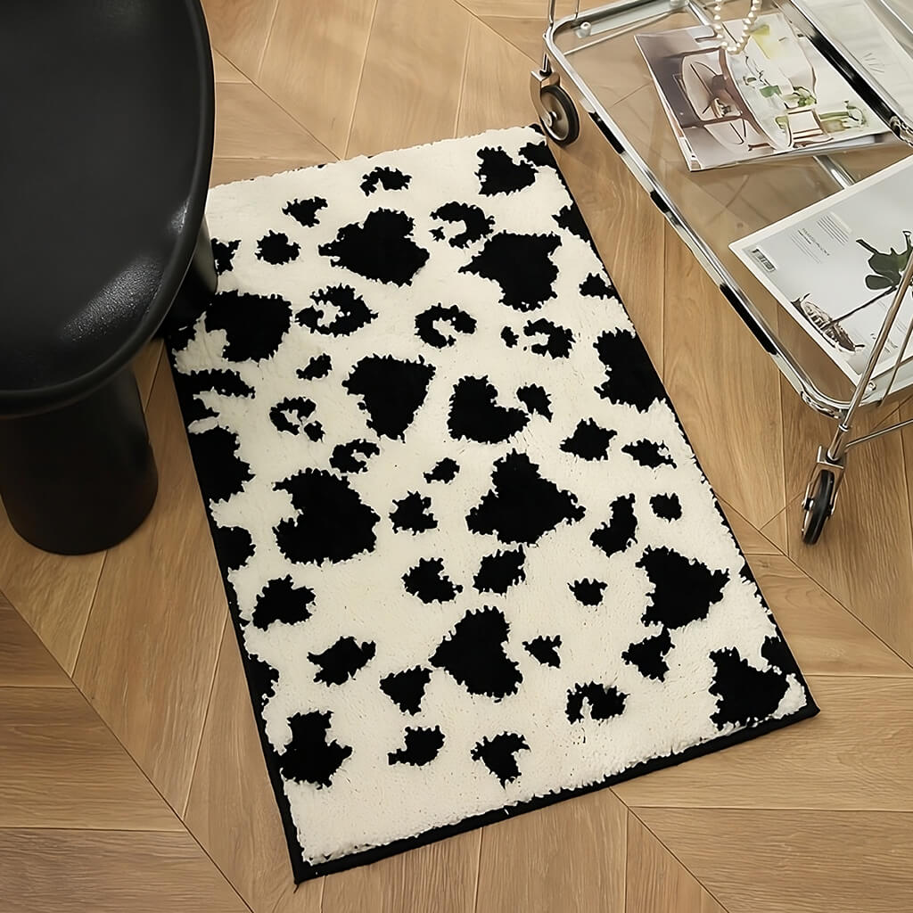 cow print black and white tufted rug