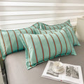 cute aesthetic bedding set in turquoise color with orange stripes roomtery