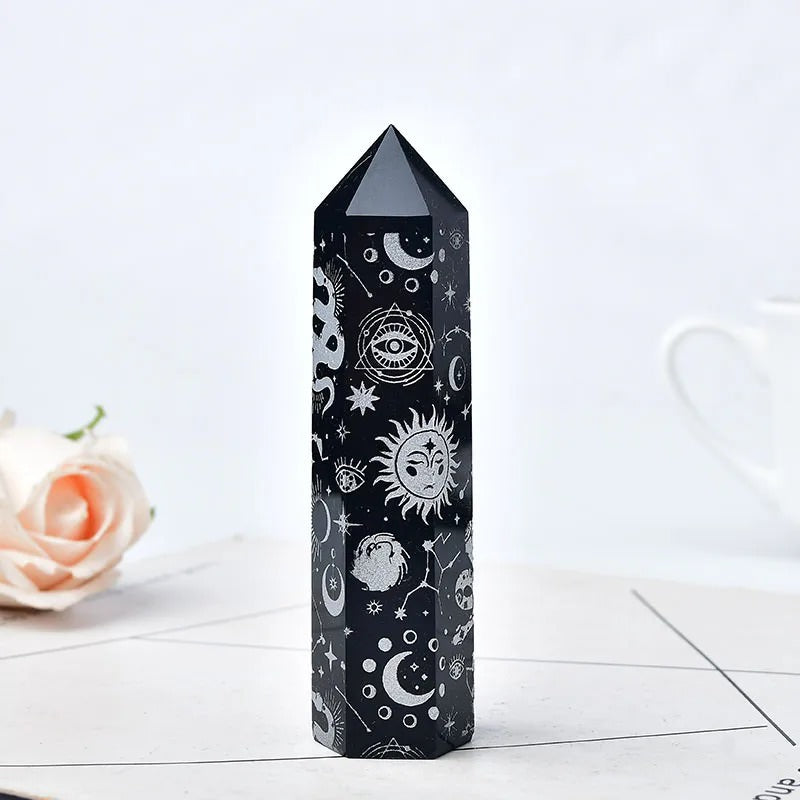 natural obsidian pointing tower crystal engraved with witchy sun and moon pattern roomtery