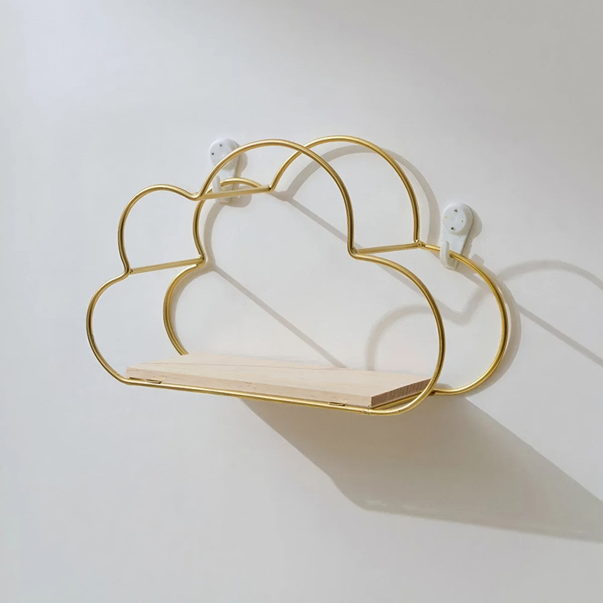 cloud shaped wall shelf made of golden frame wire