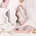 wavy irregular curvy wall mirror in danish pastel aesthetic decor roomtery