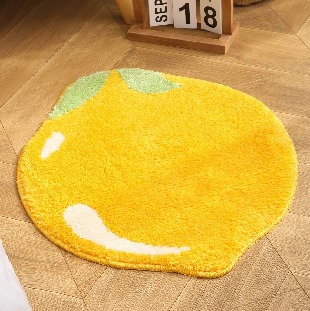 yellow lemon-shaped accent throw rug