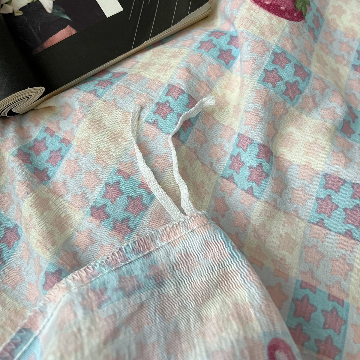 kawaii strawberry pastel checkered bedding with stars and strawberry print in dusty pink shades