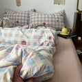 kawaii strawberry pastel checkered bedding with stars and strawberry print in dusty pink shades