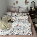 kawaii strawberry pastel checkered bedding with stars and strawberry print in dusty pink shades