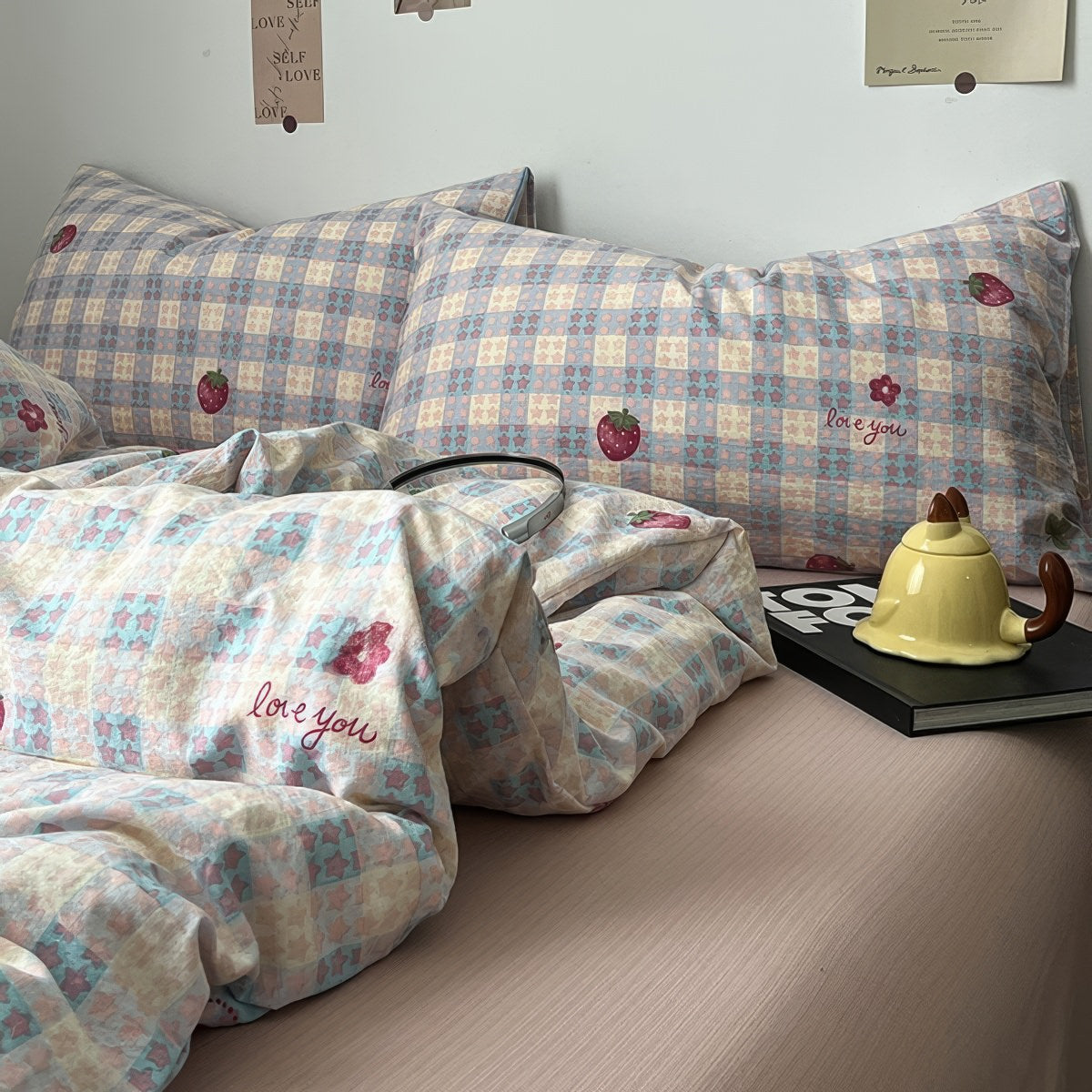 kawaii strawberry pastel checkered bedding with stars and strawberry print in dusty pink shades