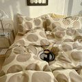 aesthetic bedding duvet cover set with large beige polka dot pattern print on beige/white background
