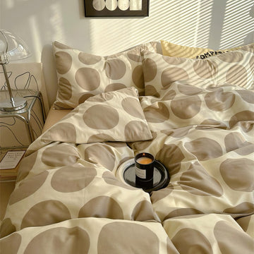 aesthetic bedding duvet cover set with large beige polka dot pattern print on beige/white background