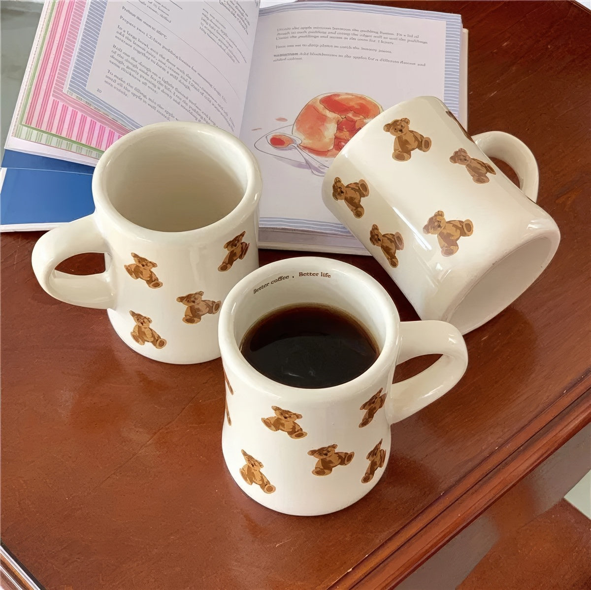 beige mug with teddy bear pattern on a white background