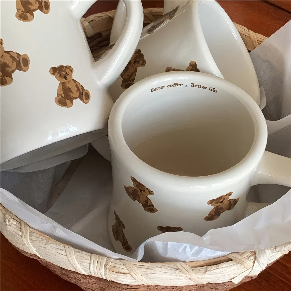 beige mug with teddy bear pattern on a white background