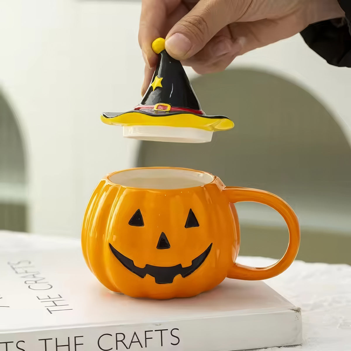 Pumpkin-shaped mug with witch hat lid halloween aesthetic