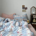 coquette aesthetic pale blue and pink bedding set with a print of cute laces, bows and pink roses