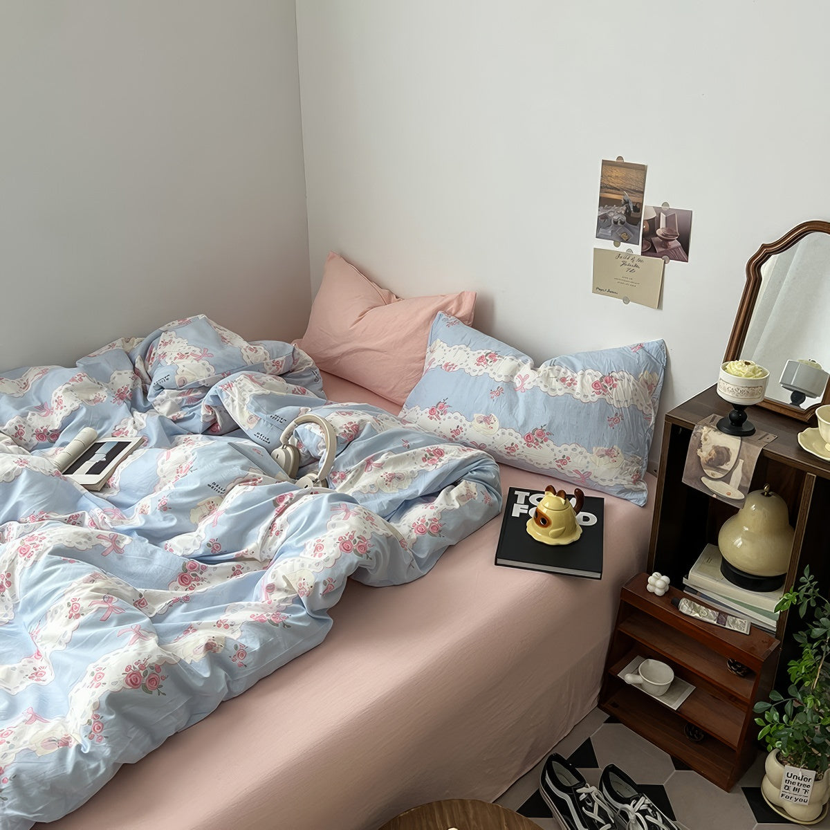 coquette aesthetic pale blue and pink bedding set with a print of cute laces, bows and pink roses