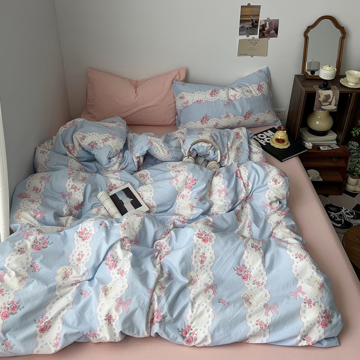 coquette aesthetic pale blue and pink bedding set with a print of cute laces, bows and pink roses