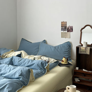 sage blue and yellow color palette minimalist aesthetic bedding duvet cover set with stitched edges