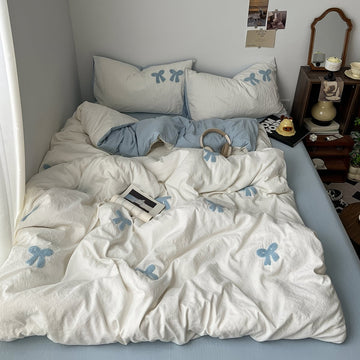 vintage pale blue color bedding duvet cover set with embroidered tufted blue bows