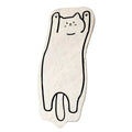 A soft, white floor mat shaped like a stretched-out cat with a simple black outline
