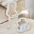 wavy irregular curvy wall mirror in danish pastel aesthetic decor roomtery