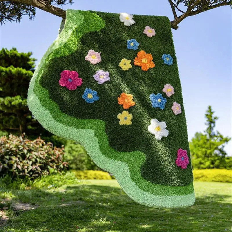 green lawn irregular shaped blooming colorful flowers tufted bedside accent rug