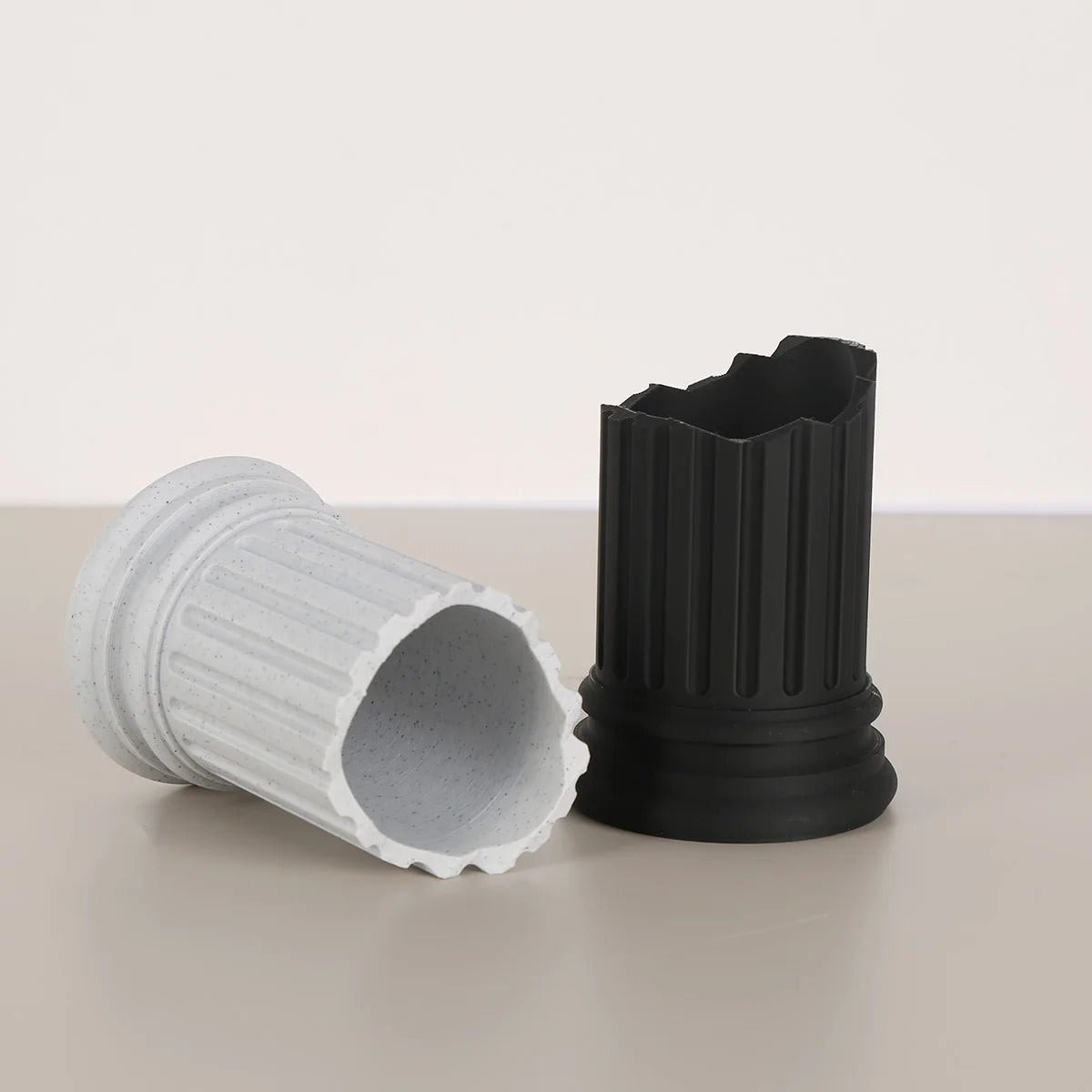 broken ancient column shaped pen holder