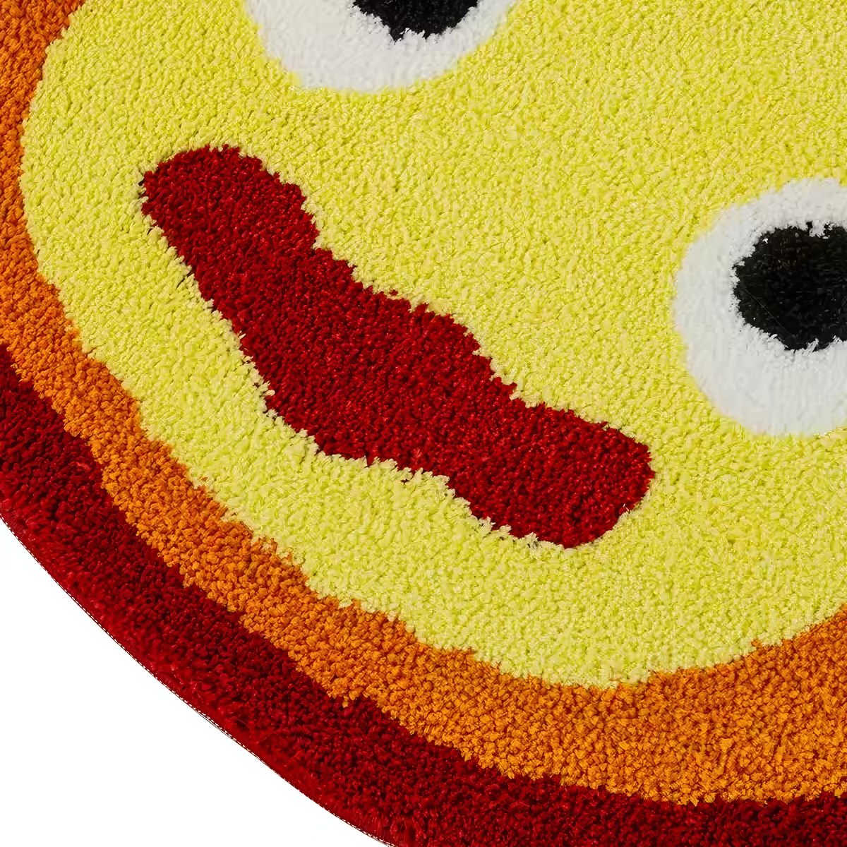 Flame-shaped rug with a cartoon face from anime