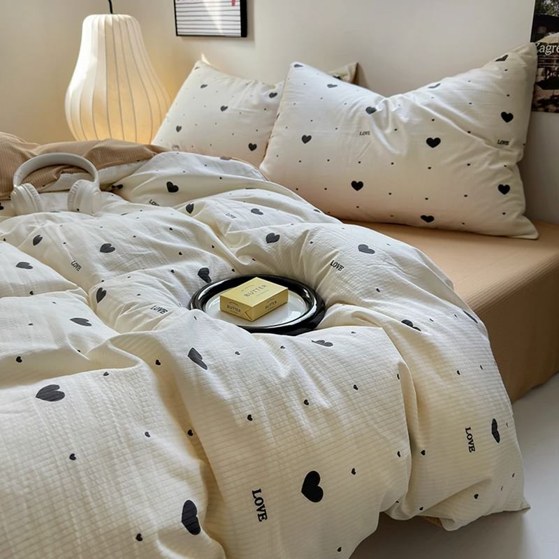light beige duvet cover with black hearts pattern print with matching sham set bedding roomtery
