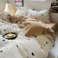 light beige duvet cover with black hearts pattern print with matching sham set bedding roomtery