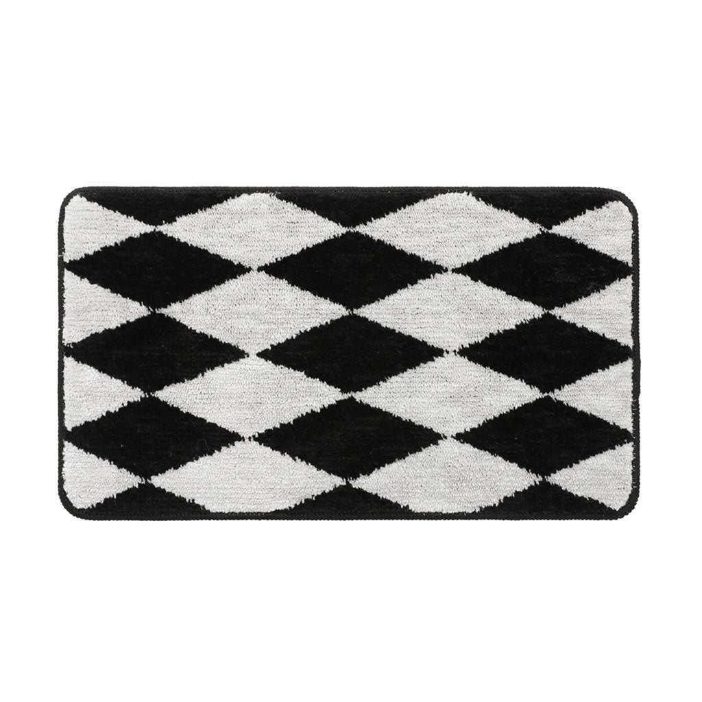 black and white argyle print accent rug