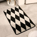 black and white argyle print accent rug