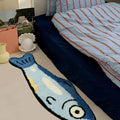 Blue fish-shaped tufted accent rug
