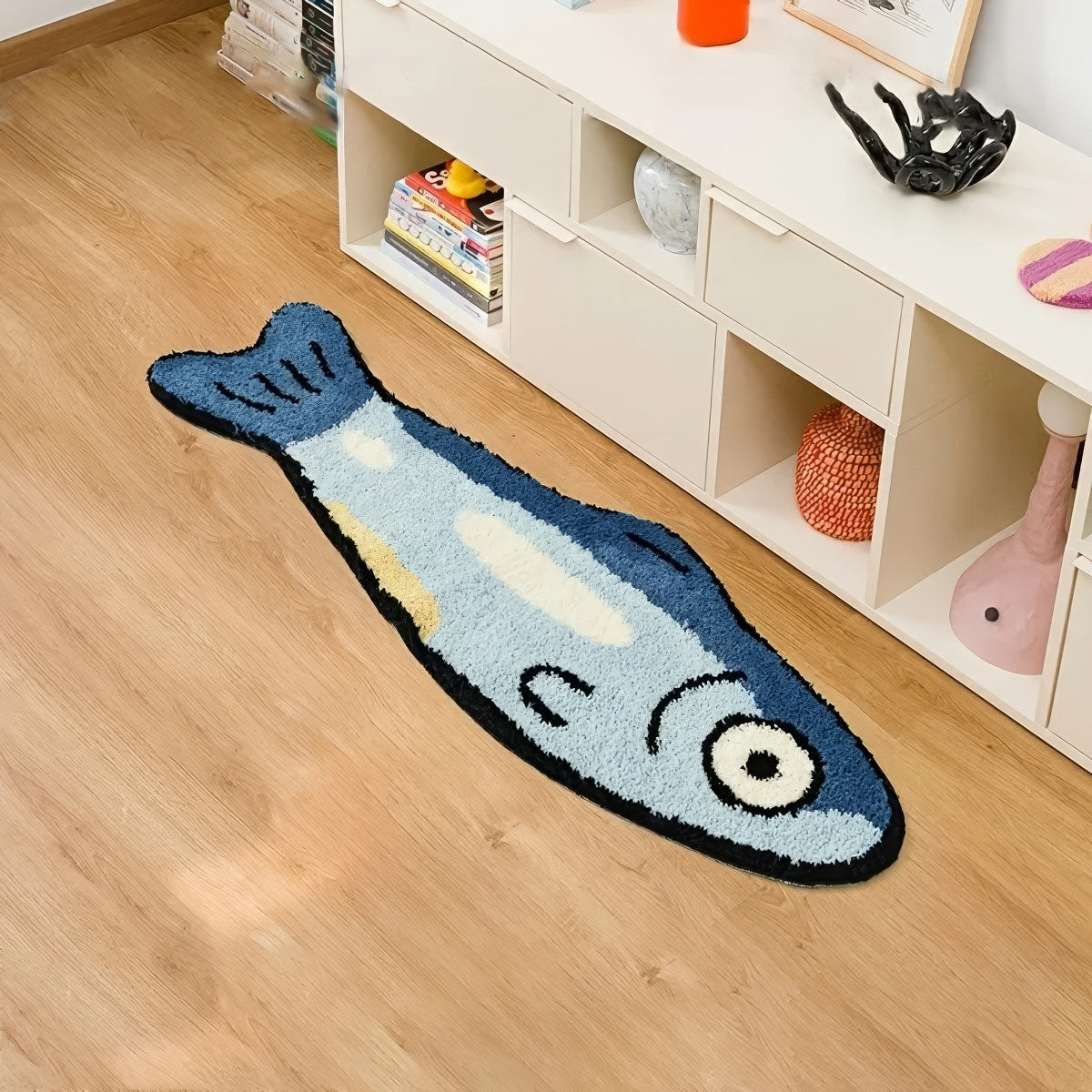 Blue fish-shaped tufted accent rug