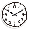 Round cartoon doodle wall clock with hand-drawn style numbers and sketch-like outline in black and white.