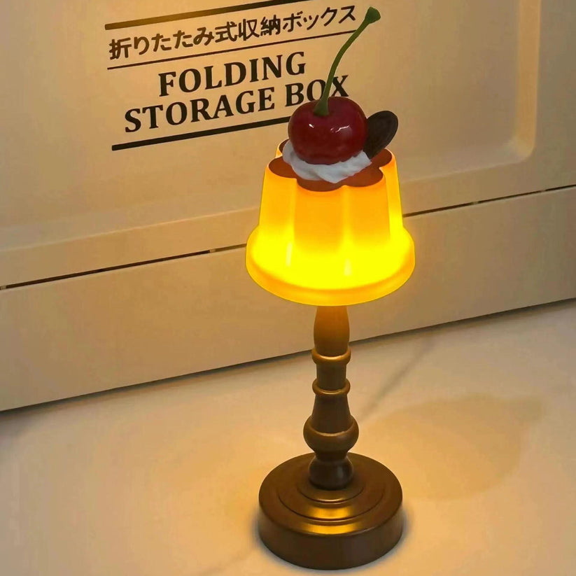 Cherry Pudding Mini Table Lamp glowing in bedroom corner