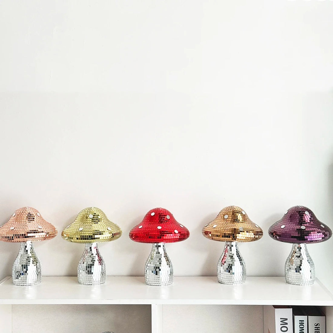 Mushroom-shaped disco with colorful mirrors on the hat and silver base