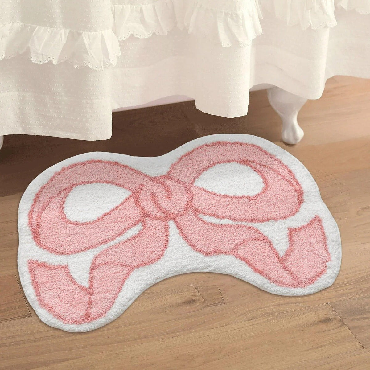 Pink bow-shaped bath mat coquette aesthetic accent rug
