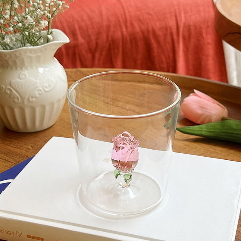 https://roomtery.com/cdn/shop/files/coquette-aesthetic-glass-cup-with-rosebud-figurine-roomtery3.jpg?v=1684867916&width=1946