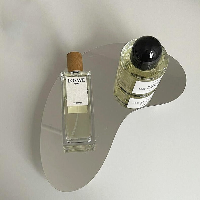 mirrored or black acrylic tray for organizing perfumes and cosmetics