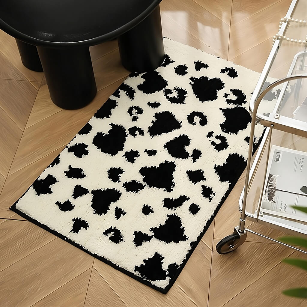 cow print black and white tufted rug