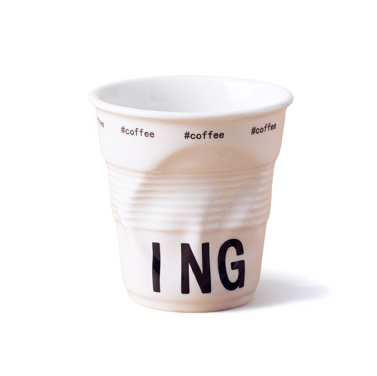 White ceramic coffee mug shaped like a crumpled takeaway coffee cup with black TOASTING lettering and #coffee print around the rim.