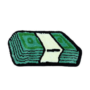 Tufted area rug designed as a stack of green dollar cash bills with a cream paper band