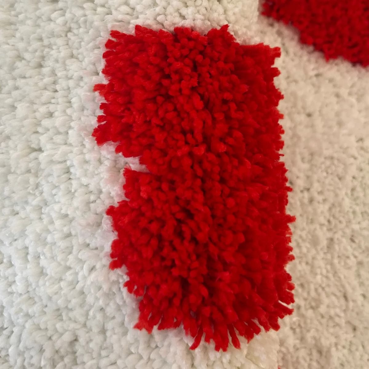 tufted accent rug shaped in a form of eight of earts playing card 