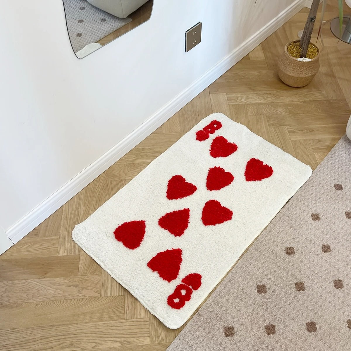 tufted accent rug shaped in a form of eight of earts playing card 