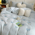 fluffy plush sherpa aesthetic bedding set with embroidered bow pattern