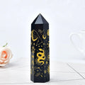 natural obsidian pointing tower crystal engraved with witchy sun and moon pattern roomtery
