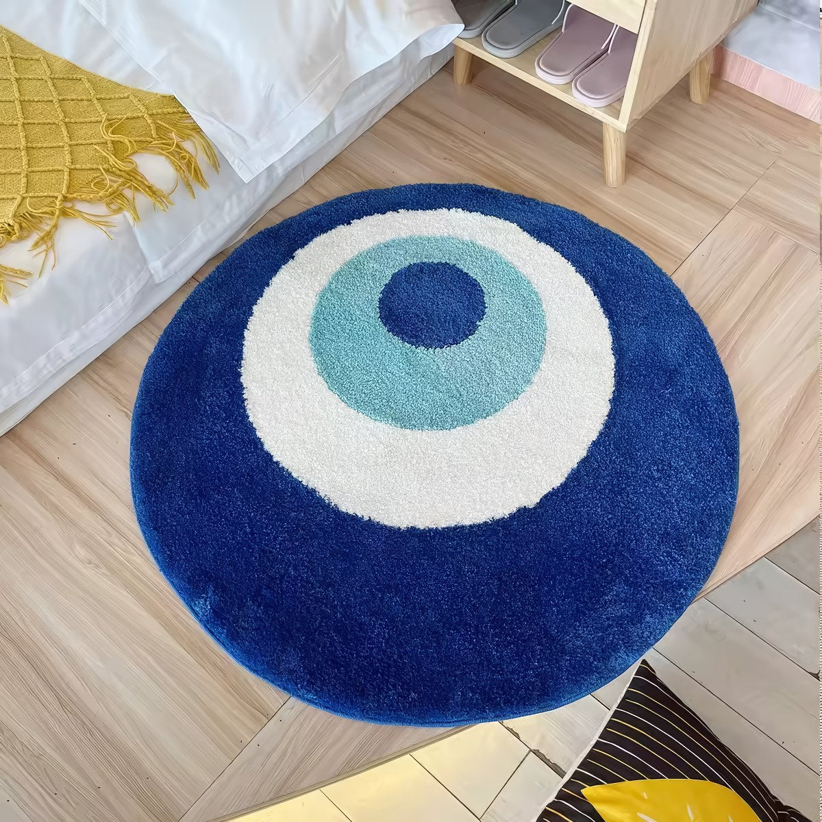 blue evil eye round shaped tufted accent rug